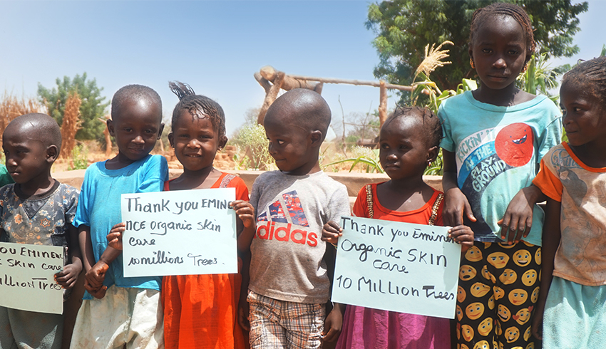 Young children from Senegal, Africa, stand in row